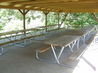 Picnis tables inside Cody Lake shelter.