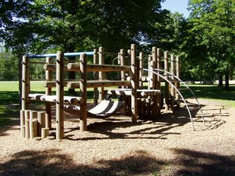 Playground equipment located near the shelter.