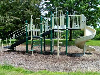 Playground equipment conveniently located near the shelter.