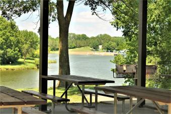 View of the lake from inside the picnic shelter.