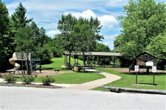 Breezy Point picnic shelter and playground equipment.