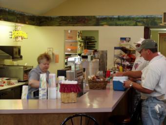 Customer ordering food from concession area.