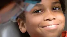 Child receiving dental screening
