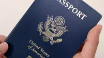 Holding a US Passport.