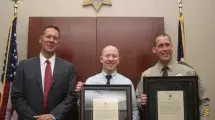 The Sheriff with Lieutenant Joe Caffery and Deputy Dan Grafton.