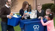 Neighborhood comes together to recycle around new cart.