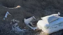 Sand and empty sandbags.