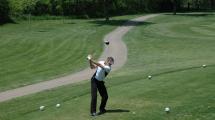 Golfer preparing swing.