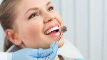 Woman smiling at dentist 