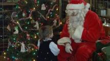 Little girl speaking to Santa.