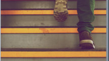 Image of person walking up stairs