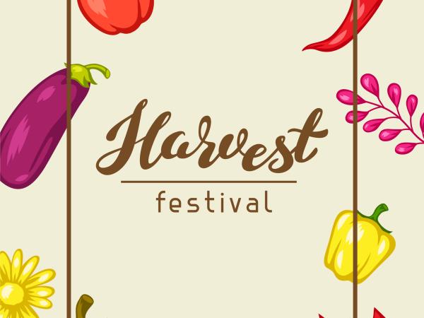 harvest festival sign with pumpkins, and other harvested crops