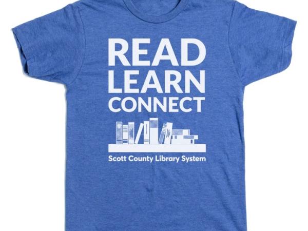 This is a shirt that says Read Learn Connect Scott County Library System.