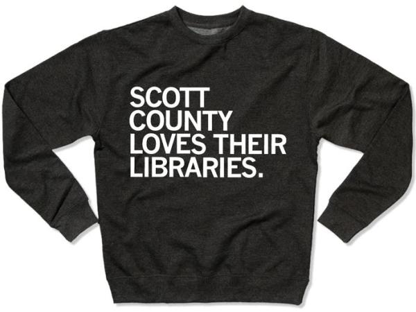 This is a crew sweatshirt that says Scott County Loves Their Libraries.