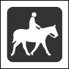 Outline of a horse and rider.